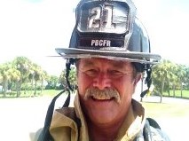 Founder Brian Johnson in his firefighter helmet
